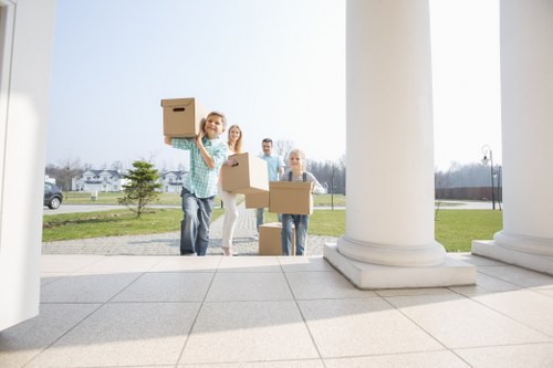 Professional movers loading furniture