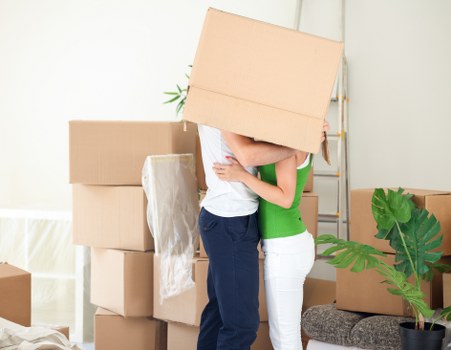 Professional removal team packing belongings