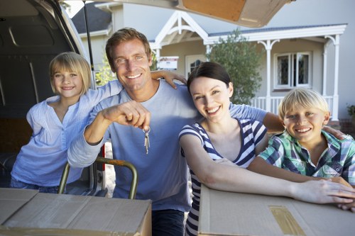 Professional removal team handling furniture in Tooting